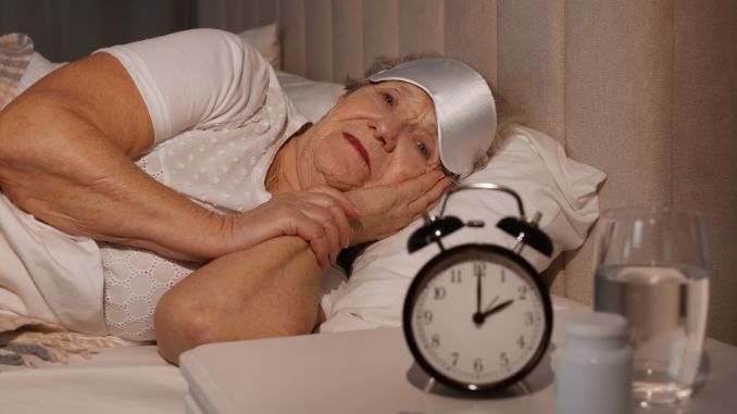 elderly woman suffering from insomnia