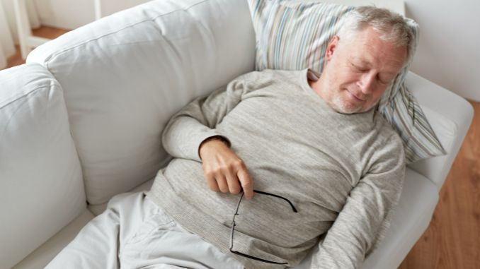 senior man sleeping in sofa - Why Do Old People Sleep So Much