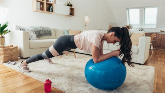 improving-her-core-strength-and-stability - Slam Ball Exercises