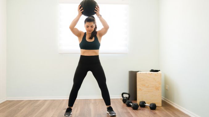 woman in with strong arms and a toned body