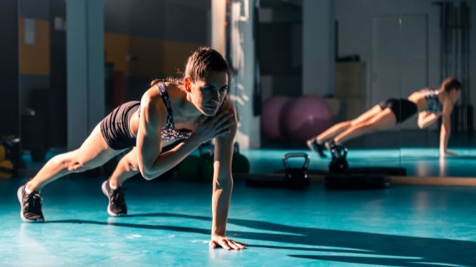 plank shoulder taps - cross training workouts